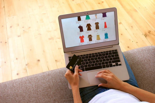 Woman shopping for clothes online